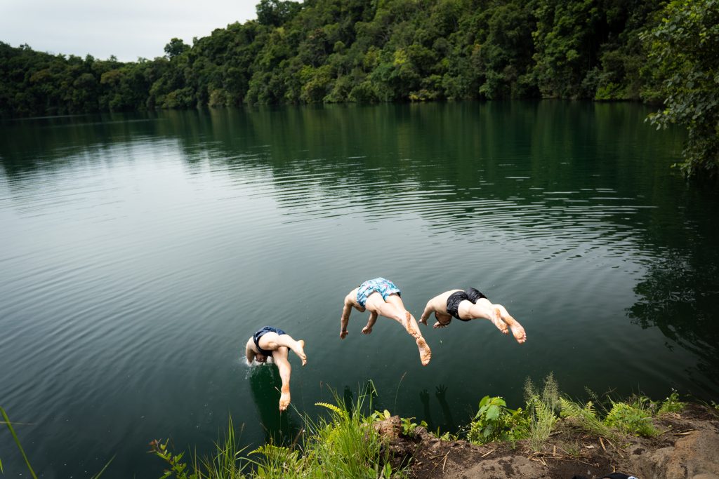 Dave the Cave clients swiming at the transparent lake Kamunzuku